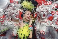 Carmen Miranda and Carnaval  revelers near Ipanema Beach.