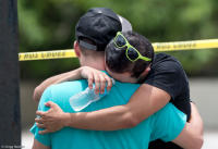 A man weeps for victims of the Pulse nightclub mass shootings in Florida.