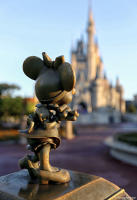 Minnie Mouse and Cinderella Castle at Disney's Magic Kingdom.
