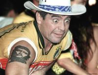Wide-eyed Argentine soccer legend Diego Maradona at Carnival in Rio.