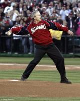 Tossing the first pitch at the Nationals home opener.
