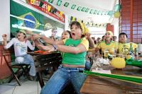 Anxious moment as fans at a bar watch Brazil play a World Cup game.