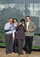 British Prime Minister Tony Blair's wife snaps a picture at Iguazu Falls.