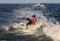 Wipeout while surfing at Praia do Forte Beach in Bahia.